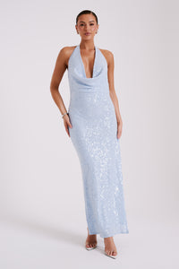 Take your style to the next level with our Brooks Maxi Dress. The sparkling blue ice color will make you stand out in any crowd, while the maxi length adds an elegant touch. Perfect for any special occasion, this dress will have you looking and feeling your best.