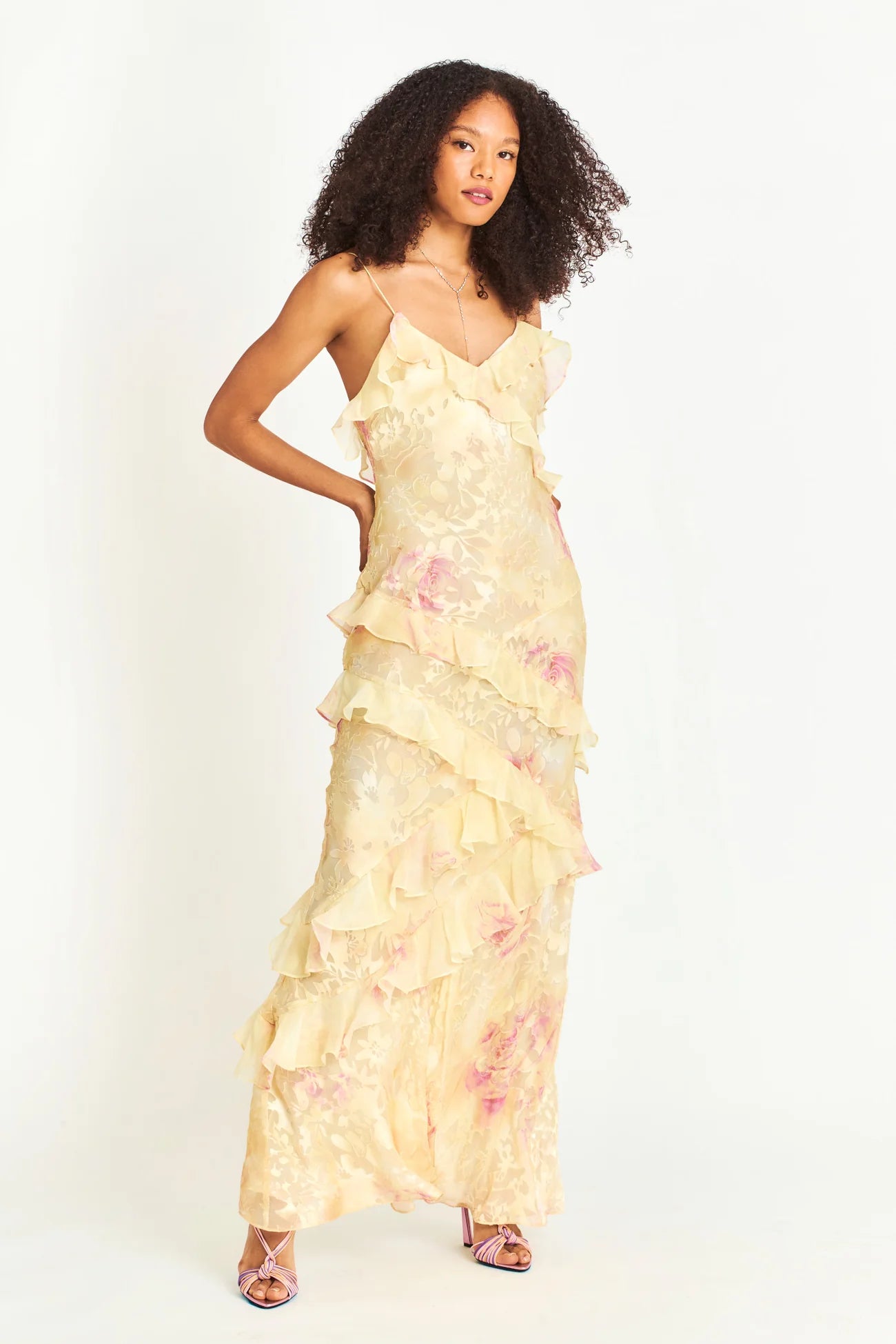 Introducing the Love Shack Fancy Rialto Dress. Made from crinkle burnout chiffon, this maxi dress is perfect for sunsets and dancing. With vibrant floral print and asymmetrical ruffles, it offers a unique and sexy silhouette. Plus, a side seam zipper ensures a perfect fit.