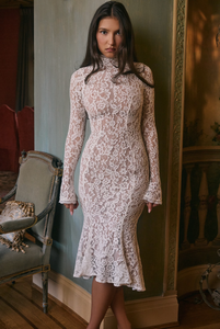 Get ready to turn heads with the Sophia Midi Dress. This dress combines modern flair and romantic elegance. Its body-hugging silhouette, high neck, and long sleeves beautifully highlight your shape while keeping it sophisticated. The ivory lace adds a touch of texture, and the fluted hem and cuffs add a playful twist to this timeless design.