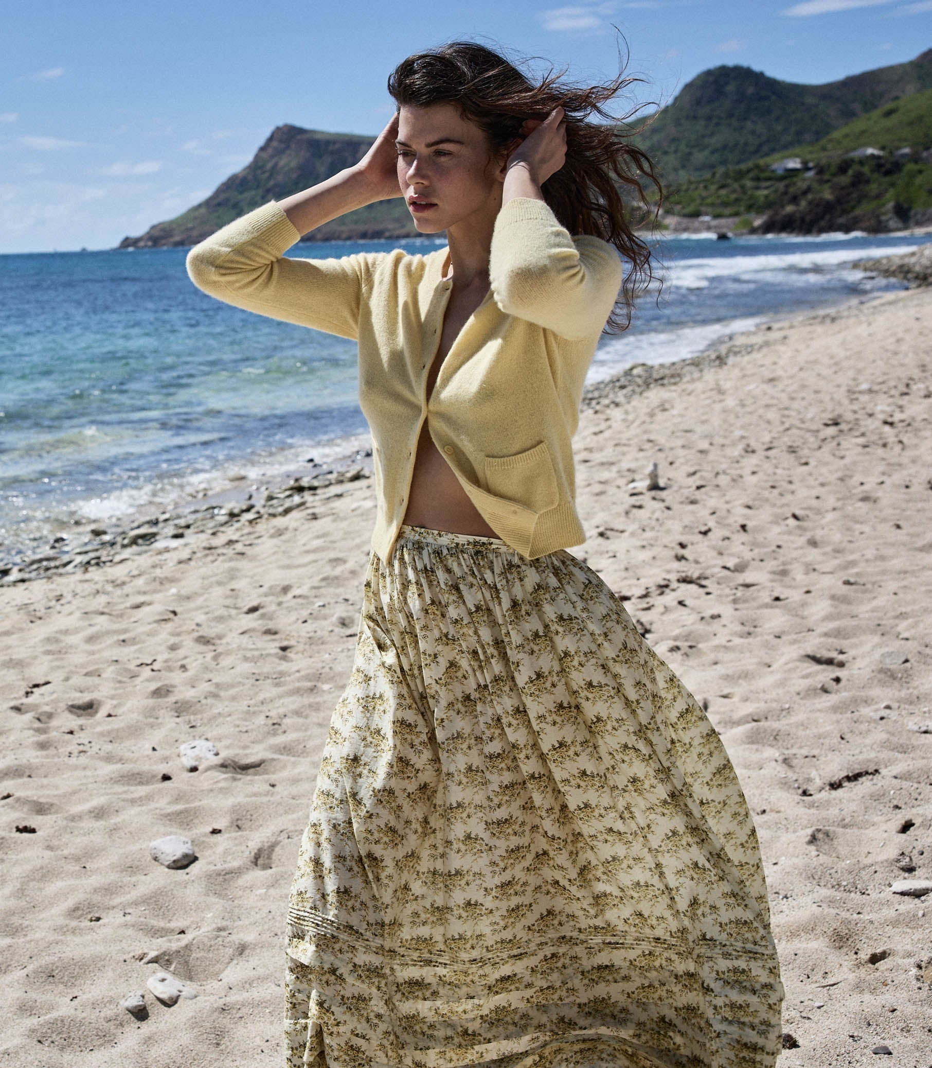 Elevate your wardrobe with the Marcie Skirt in Citron Rosier Floral by Doen, designed for timeless elegance and comfort. Crafted from a soft organic cotton and viscose blend, this high-waisted skirt features a flowing ankle-length silhouette adorned with a vintage-inspired poppy field print. Pintuck details and an invisible side zipper provide a flattering fit, making it a versatile choice for both casual days and special occasions. Experience effortless style with every wear.