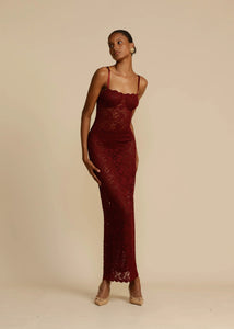 Elevate your evening look with Margot Lace Dress. This vintage-inspired lace dress in deep Wine exudes seductive allure and classic glamour. Featuring a semi-sweetheart neckline and a floor-length maxi with a center back split, Margot compliments your curves and allows for custom adjustments with gold fastenings on the shoulder straps. Lined at the bust for coverage and support, Margot is the perfect blend of comfort and sophistication.