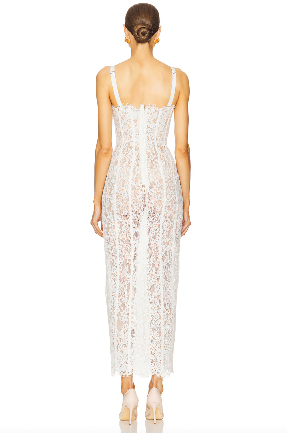 The Lace Column Dress by Helsa combines refined craftsmanship with daring elegance. Its delicate bustier and adjustable shoulder straps allow for a tailored fit, while the unlined, sheer fabric provides breathable comfort and a subtle reveal beneath. Featuring a hidden back zipper, this dress maintains a seamless silhouette, making it an ideal choice for sophisticated occasions where understated allure is key.