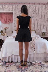 Elevate your look with the Marie Therese Mini dress by Mirroir Palais. Crafted with care, this dress features dainty cotton eyelet fabric and intricate ladder lace trim, giving a touch of romance. The luxurious silk charmeuse ties at the neckline and center front, while the side seam slits offer both style and comfort. Perfect for any occasion.