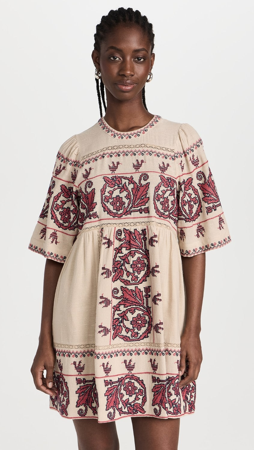 Indulge in elegance with the Beena Crochet Mini Dress by SEA. Crafted with delicate cross stitching embroidery and short sleeves, this dress boasts a mini silhouette for a touch of sophistication. Perfect for any occasion, elevate your wardrobe with this exclusive piece.