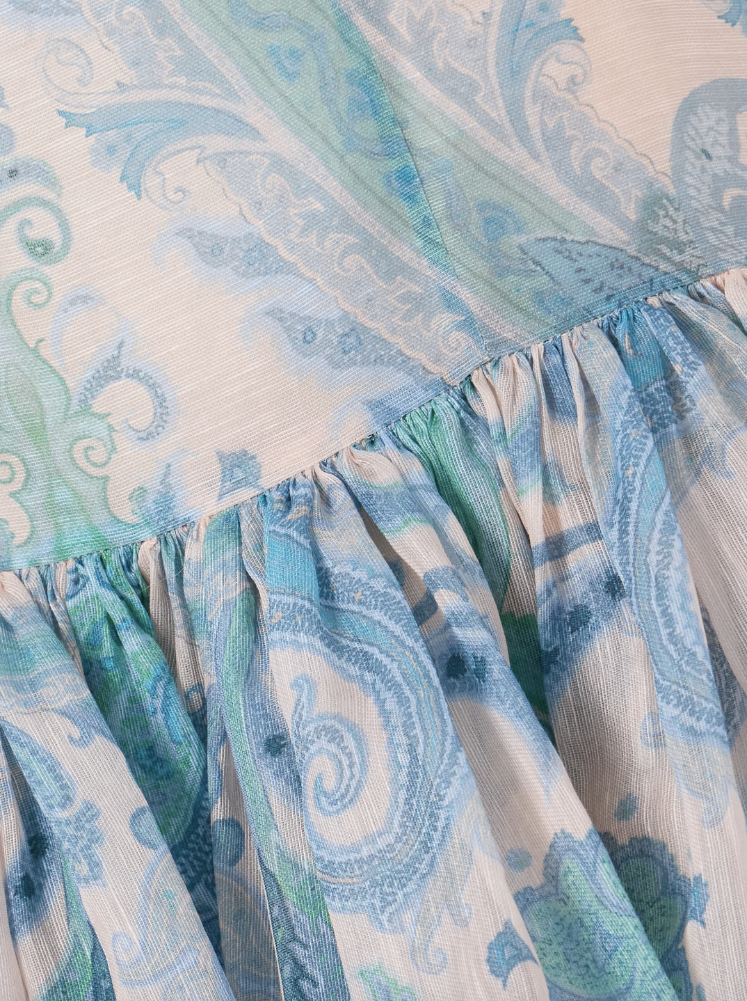 Elevate your elegance with Zimmermann's Illuminate gown, crafted from a luxurious linen and silk blend adorned with vibrant paisley swirls. This stunning dress features intricate bead embellishments along the sweetheart neckline, straps, and ruffled mermaid hem, adding a sparkling touch to your look. Designed with padded, underwired cups, it offers gentle support while enhancing your silhouette. 