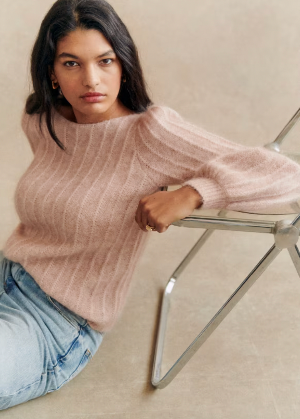 Stay cozy and chic in the Aretha Jumper. Made from a luxurious blend of wool and kid mohair, this jumper features long puffed sleeves and a boat neckline for a stylish and comfortable fit. The patterned knit adds a touch of texture, making it the perfect addition to your fall and winter wardrobe.