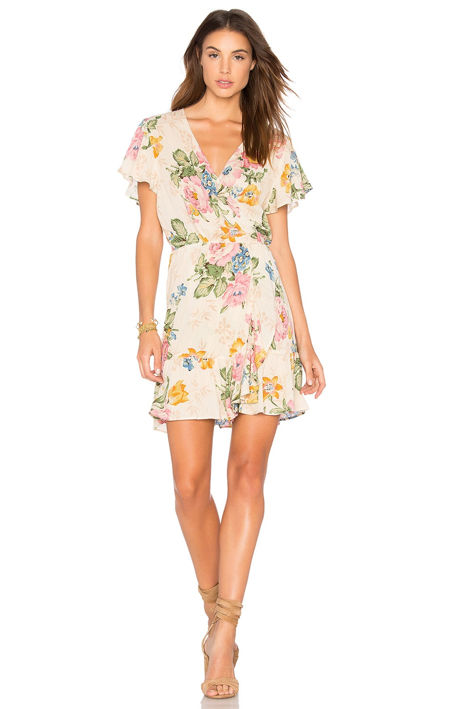 Upgrade your summer wardrobe with our Dress Auguste. This mini dress features a stylish print, lace up design, and a wrapped chest with a bow for a flattering fit. Perfect for any occasion, feel confident and chic all season long.