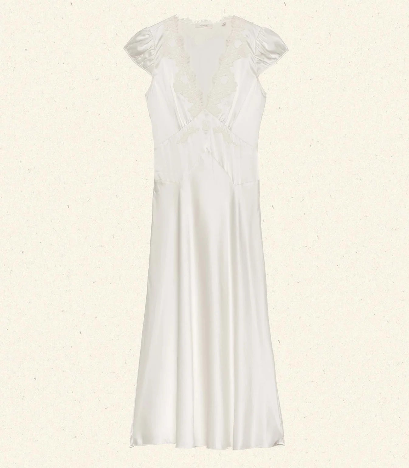 Slip into timeless elegance with the Coraline Dress by Doen, a 1930s-inspired masterpiece crafted from luxurious buttery silk satin. Gathered cap sleeves and a daring plunging V-neckline frame your silhouette, while intricate embroidered scallop lace adds vintage glamour. The fitted bodice features an invisible side seam zipper for seamless styling, paired with an adjustable back waist tie for a personalized fit. 