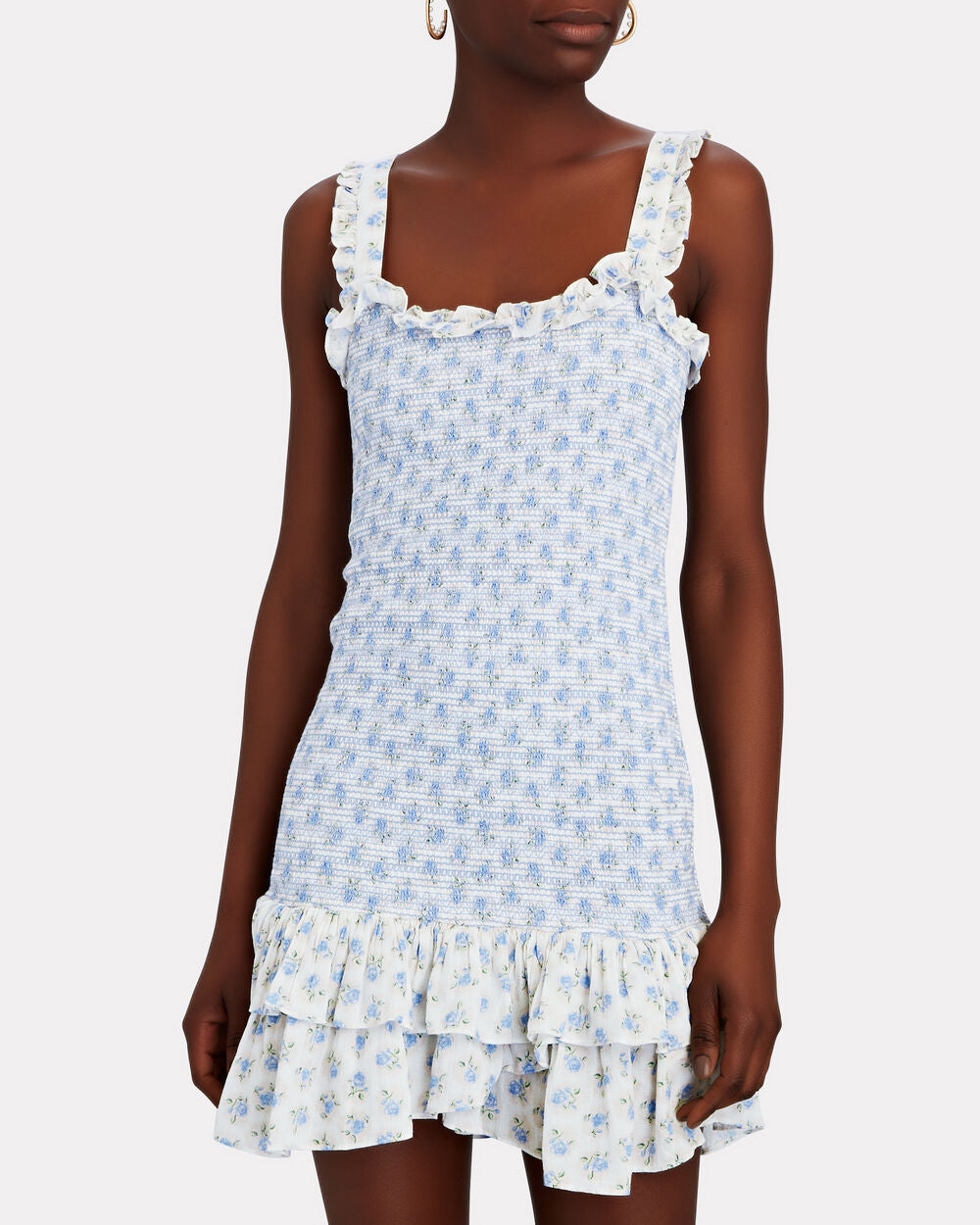 Dare to be bold and romantic in the Breyer Mini Dress by Loveshackfancy! With a delicately printed rosebud pattern, this dress boasts a flattering silhouette with a ruffle-trimmed square neckline and a fitted, smocked bodice. The whimsical ruffle-trimmed straps and layered hem will add a touch of adventure to your wardrobe.