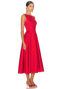 Indulge in the luxe feel of this Sateen Midi Dress. The sleek and silky fabric will elevate your style while the hidden back zipper closure provides a seamless silhouette. With side slip pockets and an unlined design, this dress offers both convenience and sophistication. Dry clean only for lasting quality.