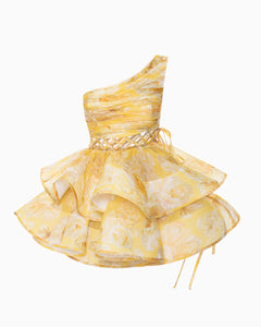 The Iris Mini Dress by YVON combines premium linen silk fabric with a delicate yellow floral print inspired by fairy forest blossoms. Its handcrafted asymmetrical bodice enhances feminine contours with refined subtlety, while the adjustable waist lacing ensures a perfectly sculpted silhouette. This dress expertly merges romantic elements with sophisticated craftsmanship, making it an exceptional choice for those seeking elegance with distinctive style.