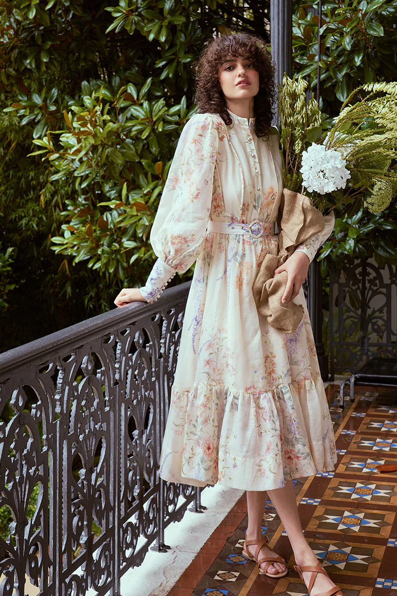 Look stunning in the Primrose Floral Dress. With a midi-maxi length, button front, and wide blouson sleeves, it's effortlessly elegant. Stay comfortable with a separate belt and side zipper opening. Lined for ultimate comfort. Feel confident and beautiful in this must-have dress.