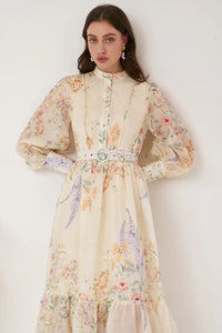 Look stunning in the Primrose Floral Dress. With a midi-maxi length, button front, and wide blouson sleeves, it's effortlessly elegant. Stay comfortable with a separate belt and side zipper opening. Lined for ultimate comfort. Feel confident and beautiful in this must-have dress.