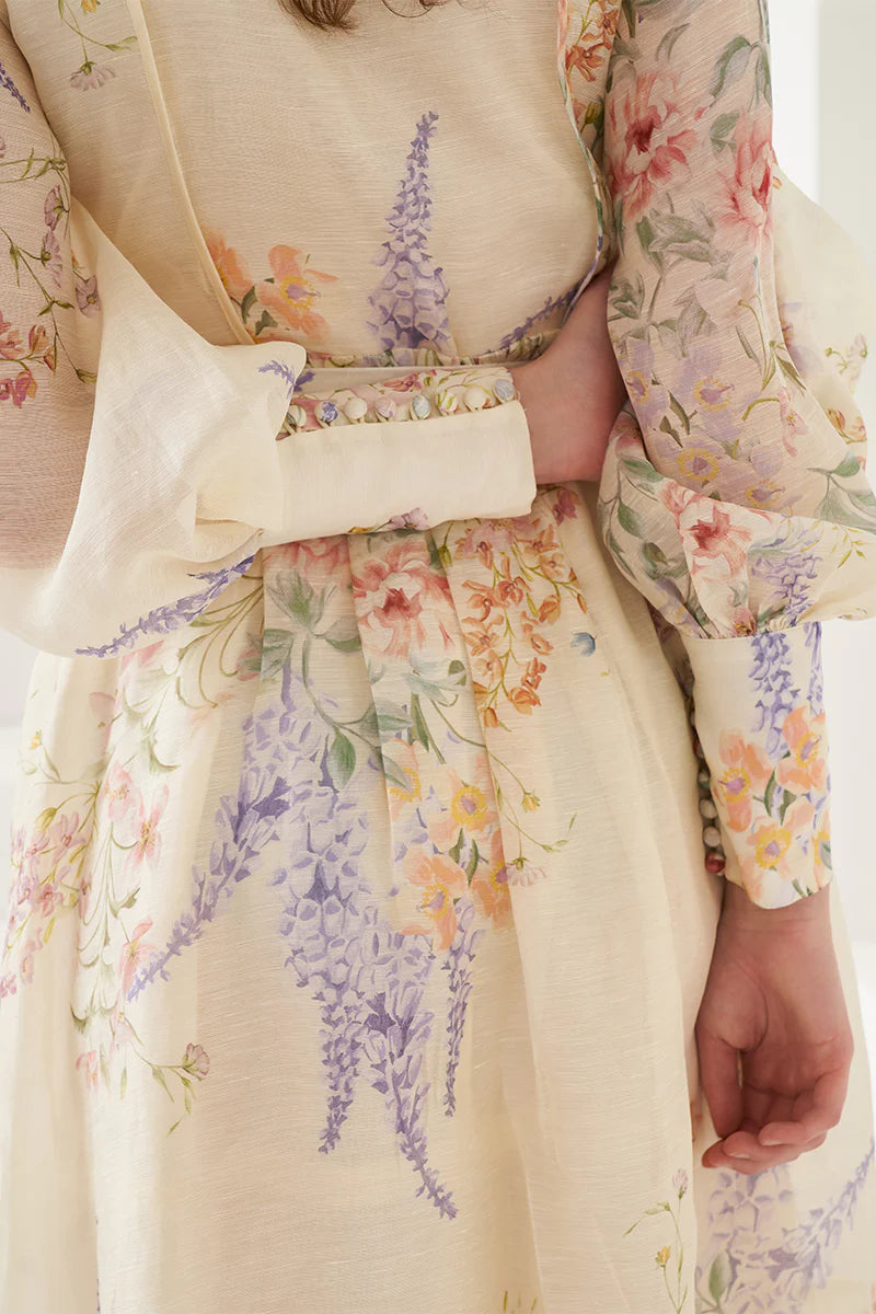 Look stunning in the Primrose Floral Dress. With a midi-maxi length, button front, and wide blouson sleeves, it's effortlessly elegant. Stay comfortable with a separate belt and side zipper opening. Lined for ultimate comfort. Feel confident and beautiful in this must-have dress.