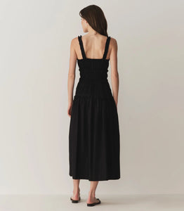 Introducing the Marianne Smocked Midi-Dress by DÔEN, an elegant and romantic piece perfect for any occasion. Made with 100% cotton and featuring a scoopneck, fixed straps, and a cinched waist, this dress will showcase your beauty in an A-line silhouette. Hand wash and imported for premium quality.