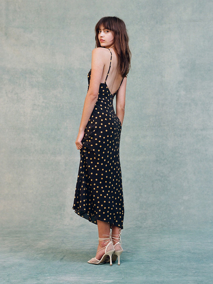 Indulge in the effortless elegance of the Iggy Dress. The 90's inspired slip dress features a flattering ankle length and fish-tail hem, with a scooped bust and low back for a touch of allure. Adjustable back straps ensure the perfect fit, while the bias cut skirt drapes beautifully in 100% silk crepe. No lining needed for a sleek and luxurious feel.