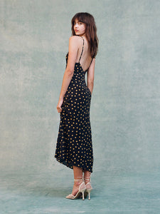 Indulge in the effortless elegance of the Iggy Dress. The 90's inspired slip dress features a flattering ankle length and fish-tail hem, with a scooped bust and low back for a touch of allure. Adjustable back straps ensure the perfect fit, while the bias cut skirt drapes beautifully in 100% silk crepe. No lining needed for a sleek and luxurious feel.