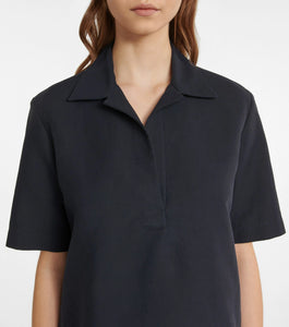 Experience effortless elegance with the Bernardine cotton shirt by The Row, meticulously crafted from pure, finely woven cotton. Featuring a spread collar and an open partial placket, this shirt offers a breezy fit that's perfect for warm weather. Its understated design reflects The Row's commitment to quality and timeless style, making it a versatile addition to your summer wardrobe.