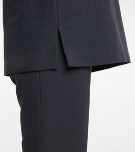 Experience effortless elegance with the Bernardine cotton shirt by The Row, meticulously crafted from pure, finely woven cotton. Featuring a spread collar and an open partial placket, this shirt offers a breezy fit that's perfect for warm weather. Its understated design reflects The Row's commitment to quality and timeless style, making it a versatile addition to your summer wardrobe.