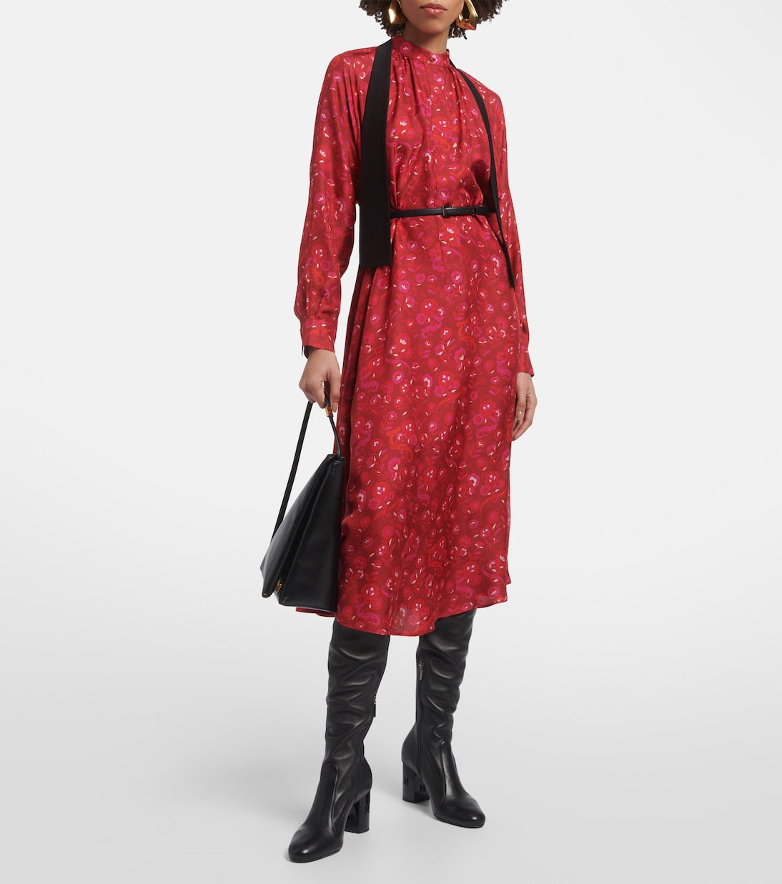 Expertly crafted in luxurious pure silk and adorned with a shimmering embroidered dragon, this midi shirtdress boasts a fluid silhouette with a flared skirt and detachable silk charmeuse belt. It features a lightly gathered mandarin collar, side pockets, and hidden button closure. Elevate your waistline with the matching leather belt.