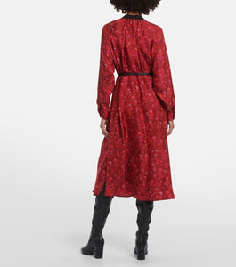 Expertly crafted in luxurious pure silk and adorned with a shimmering embroidered dragon, this midi shirtdress boasts a fluid silhouette with a flared skirt and detachable silk charmeuse belt. It features a lightly gathered mandarin collar, side pockets, and hidden button closure. Elevate your waistline with the matching leather belt.