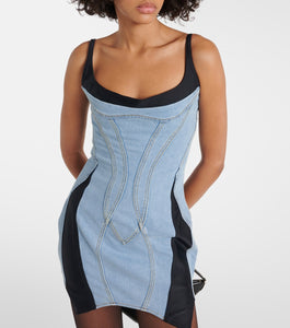 This MUGLER Blue &amp; Black Paneled Denim Minidress features a unique splicing design, adding a touch of sexy and alluring charm to your wardrobe. The backless halter style highlights your figure, while the slim fit enhances your silhouette. Perfect for a night out or special occasion.