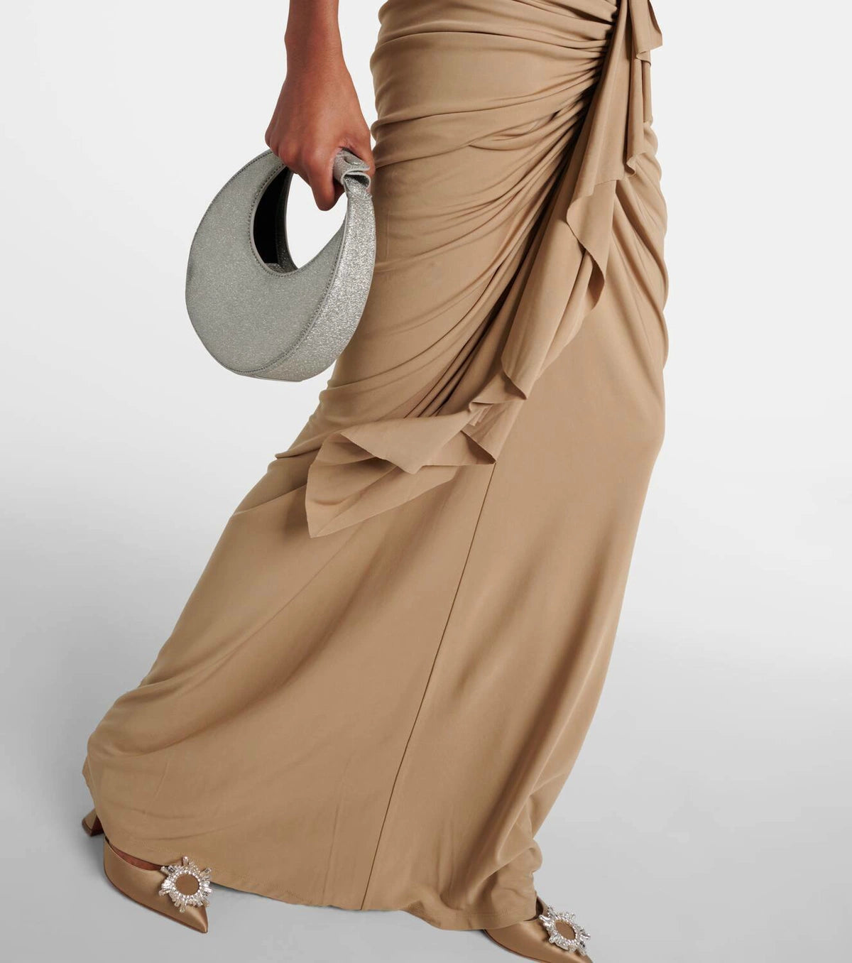 Experience comfort and style with our Vivenda Draped Jersey Maxi Dress by Christopher Esber. Handcrafted in India, this dress features a flattering fit and a stretchy fabric for a perfect fit. The zipped back closure ensures easy wear and a designer color, Incense, adds a touch of elegance. Perfect for any occasion, this dress is true to size and will make you stand out.