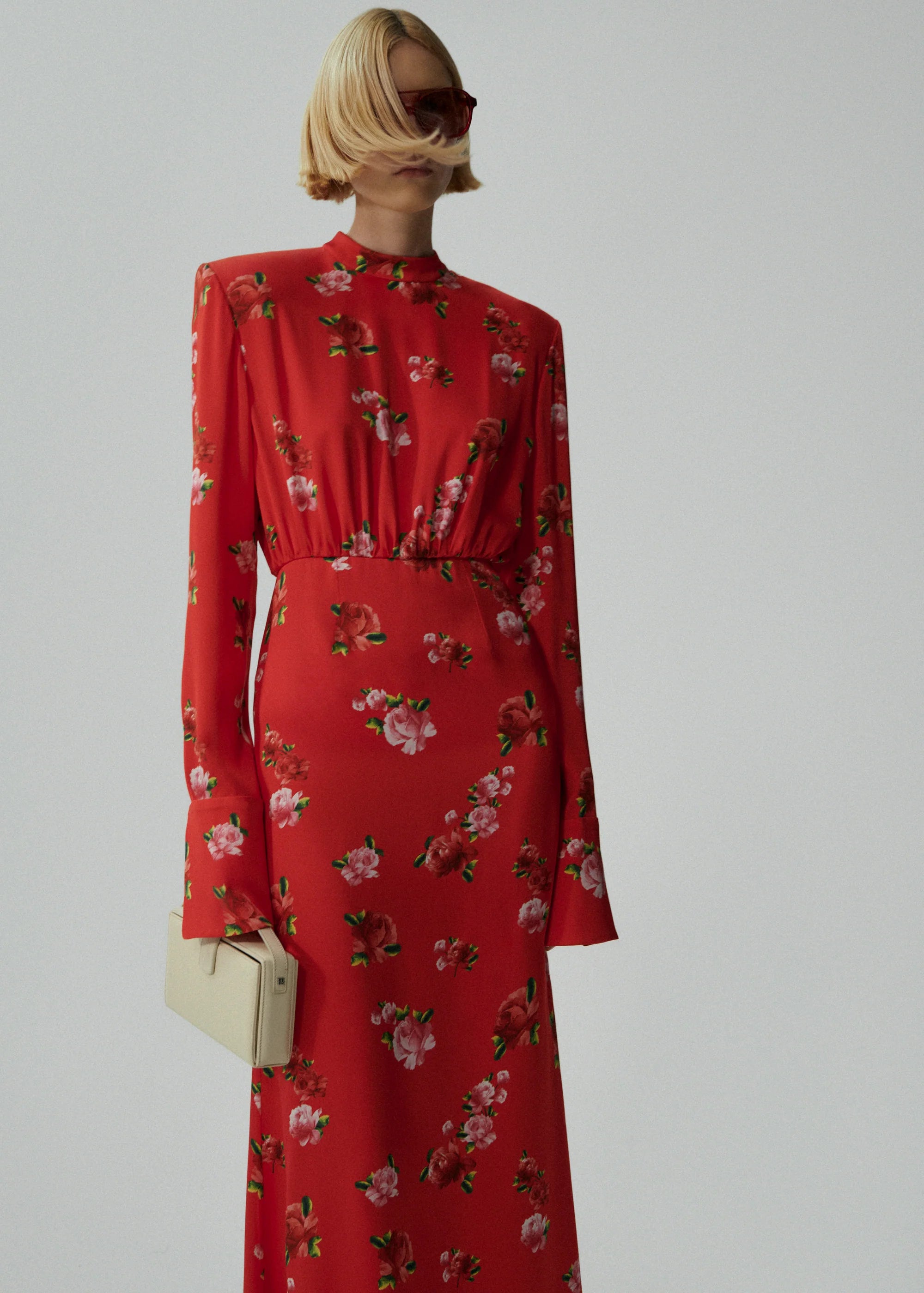 Indulge in luxury with the MAGDA BUTRYM Silk Round Neck Gown. This stunning maxi dress features a bold and elegant floral print on luxurious silk fabric, creating a truly unique and sophisticated look. The gathered design adds an extra touch of glamour, making this gown perfect for any special occasion. Elevate your style and make a statement with this exclusive piece.