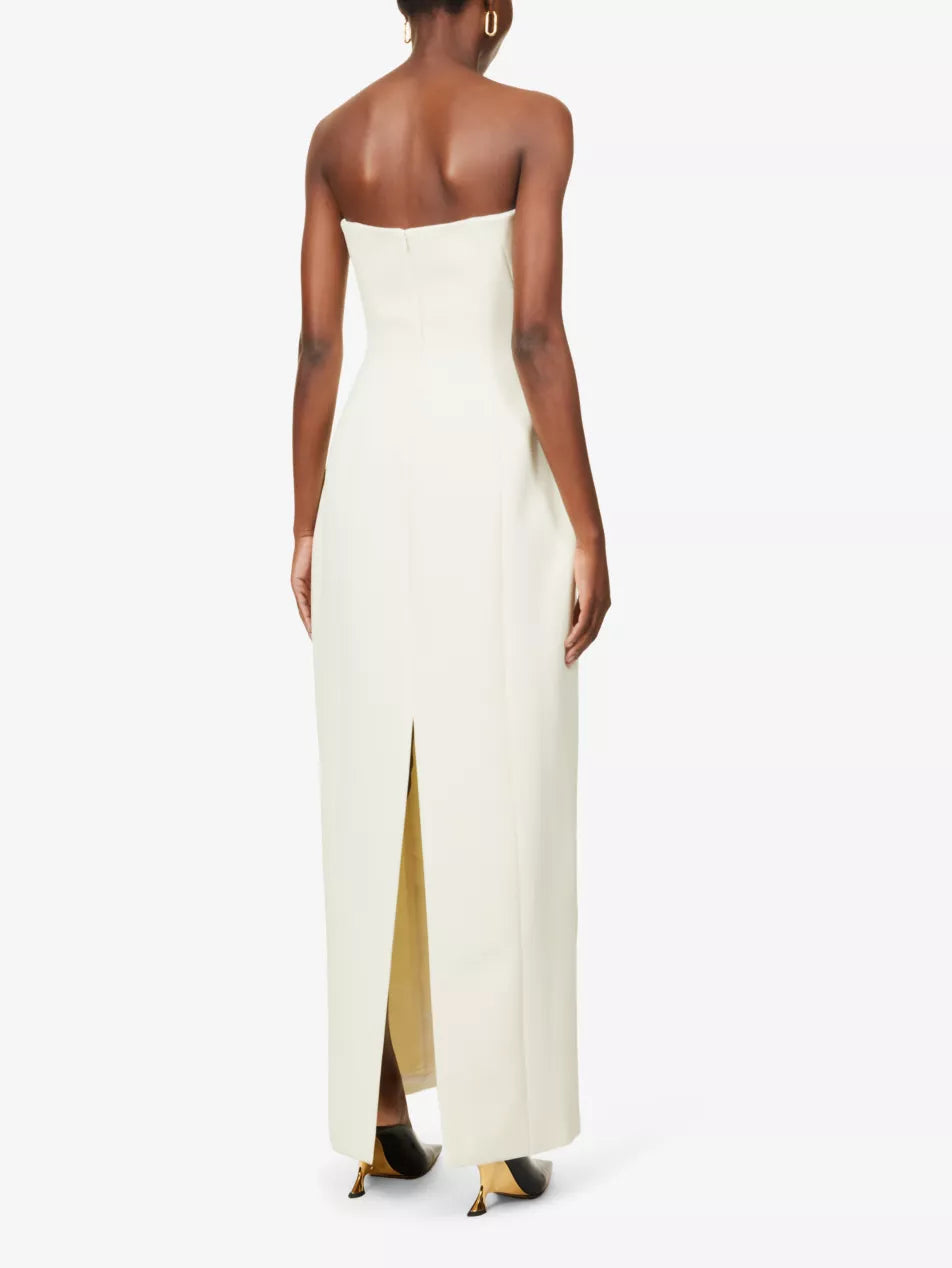 Indulge in the timeless elegance of Camilla and Marc with the Memphis Strapless Dress. Crafted from a stretch-woven fabric, this dress features a structured, strapless bodice and a full skirt that cascades to the floor. Embody the brand's signature approach to design – tailored perfection.