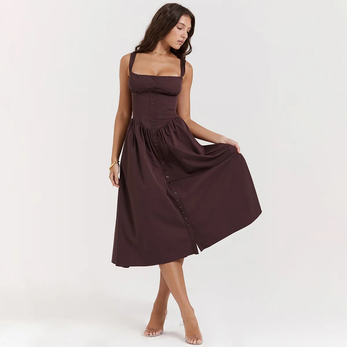 Experience the height of fashion with Dress Tatiana! This stunning midi dress features a spaghetti strap design and a beautiful brown color that will surely turn heads. Its flowing silhouette adds elegance to any outfit, making it perfect for any occasion. Be a trendsetter with Dress Tatiana!