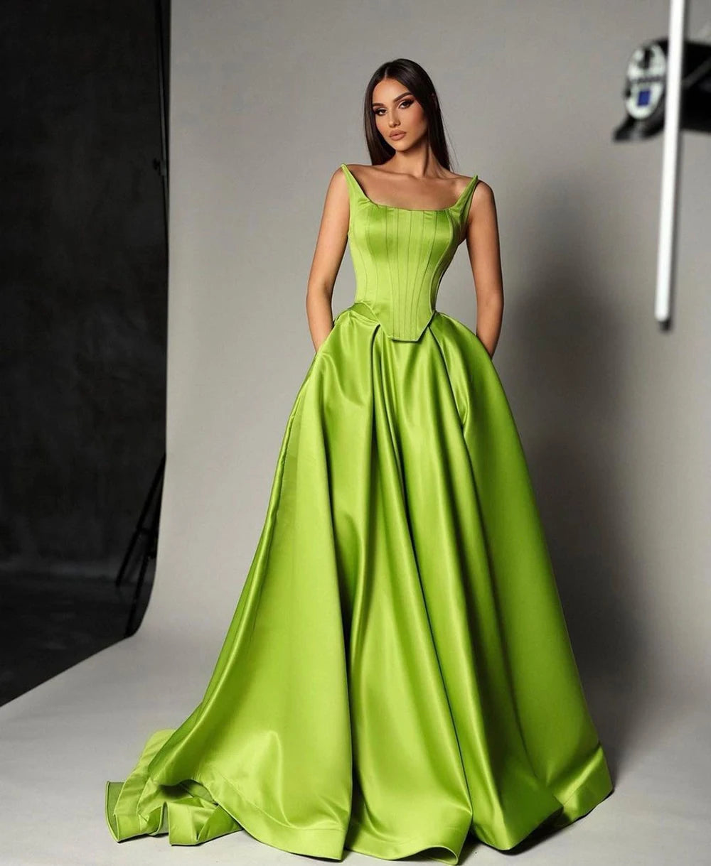 Make a statement in our Priscila Gown. Crafted from Spandex Satin, this elegant A Line dress features a rich green hue that is sure to turn heads at any evening event. With its long length, it is perfect for proms or parties. Exude sophistication and grace with our exclusive gown.