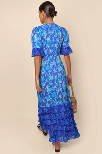 Indulge in the luxurious sophistication of the high-end designer Dress Blue Mari. Handmade with impeccable attention to detail, this long floral dress is perfect for any occasion. From casual shopping trips to elegant banquets, you'll look and feel stunning in the blue floral design. Elevate your wardrobe with this must-have piece.