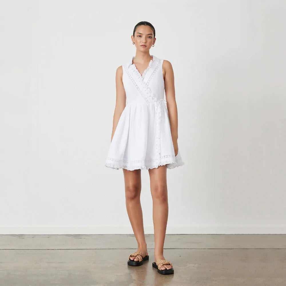 Experience effortless elegance with Dress Amelia! Crafted from luxurious Australian linen, this sleeveless dress features delicate lace detailing and a flattering wrap silhouette that accentuates your waist. Perfect for the minimalist girl seeking a touch of sophistication.