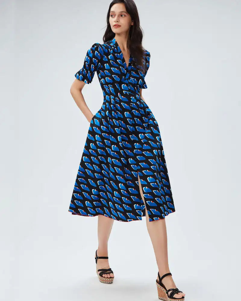 This French-inspired fashion dress exudes elegance with its unique personalized print and chic split mid length design. Be the envy of others with this luxurious and exclusive dress, perfect for any upscale event or gathering. Elevate your style and make a statement with this stunning piece.