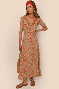 Indulge in the elegance of the Ditsy Cream Dress by RIXO. This high-quality, designer handmade dress features a ditsy cream print and a long, flowing skirt for a chic and sophisticated look. Every thread has been carefully crafted to ensure the utmost quality, making this dress a must-have for any fashion-forward individual.