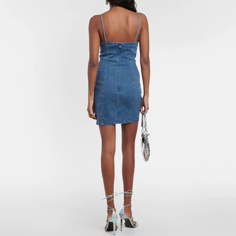 This vintage washed denim dress features a three-dimensional floral embellishment, adding a touch of femininity to the overall design. Made with high-quality cotton fabric, this dress offers both style and comfort. Perfect for any occasion, this stretchy mini dress is a must-have addition to your wardrobe.