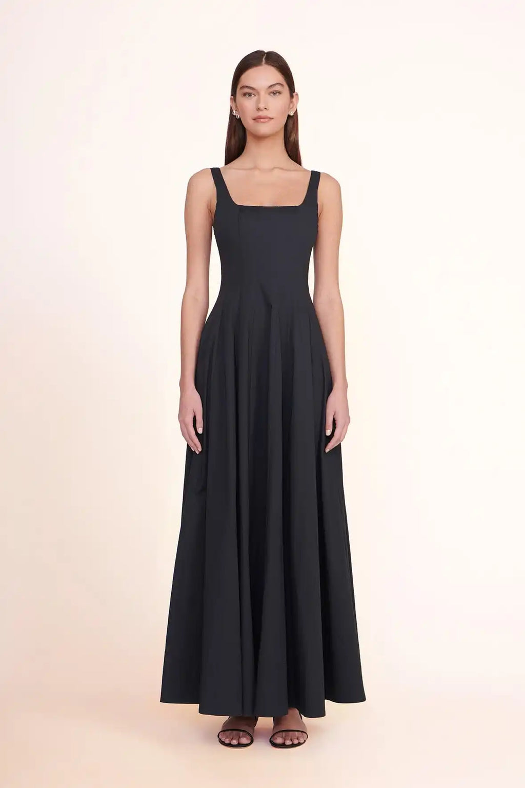 Stylishly elegant, the STAUD Wells Maxi Dress is a high-quality, designer piece that will make you feel confident and beautiful at any event. Handmade and customizable, this dress is perfect for a banquet or any upscale occasion. Make a statement with this stunning, one-of-a-kind dress.