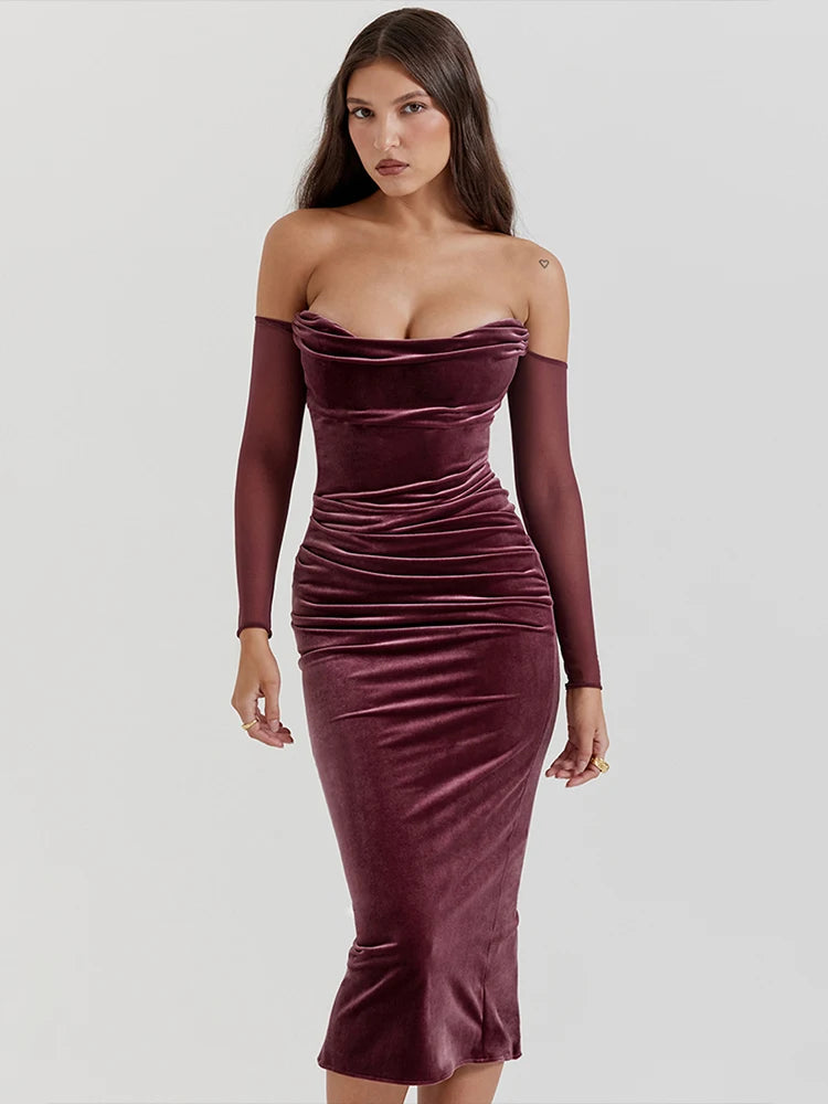 Elevate your holiday style with our Off Shoulder Velvet Dress. Made from luxurious velvet, this elegant midi dress will make a statement at any Christmas party. The off shoulder design adds a touch of glamour, making you the center of attention. Stay stylish and comfortable all night long in this chic Robe Lourdes.