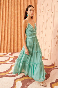 Experience the exquisite beauty of the Ulla Johnson New Mint Green Dress. Perfect for banquets and special occasions, this dress flows elegantly for a long and flattering silhouette. The soft mint color adds a touch of freshness and glamour. Make a statement and inspire others with this dress!