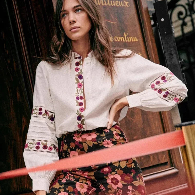 Get a touch of vintage elegance with the Chemise Megane by Sezane. This stunning piece features delicate floral embroidery, adding a feminine touch to any outfit. Made with high-quality materials, it's both stylish and comfortable. Perfect for the fashion-forward woman looking for a timeless piece.