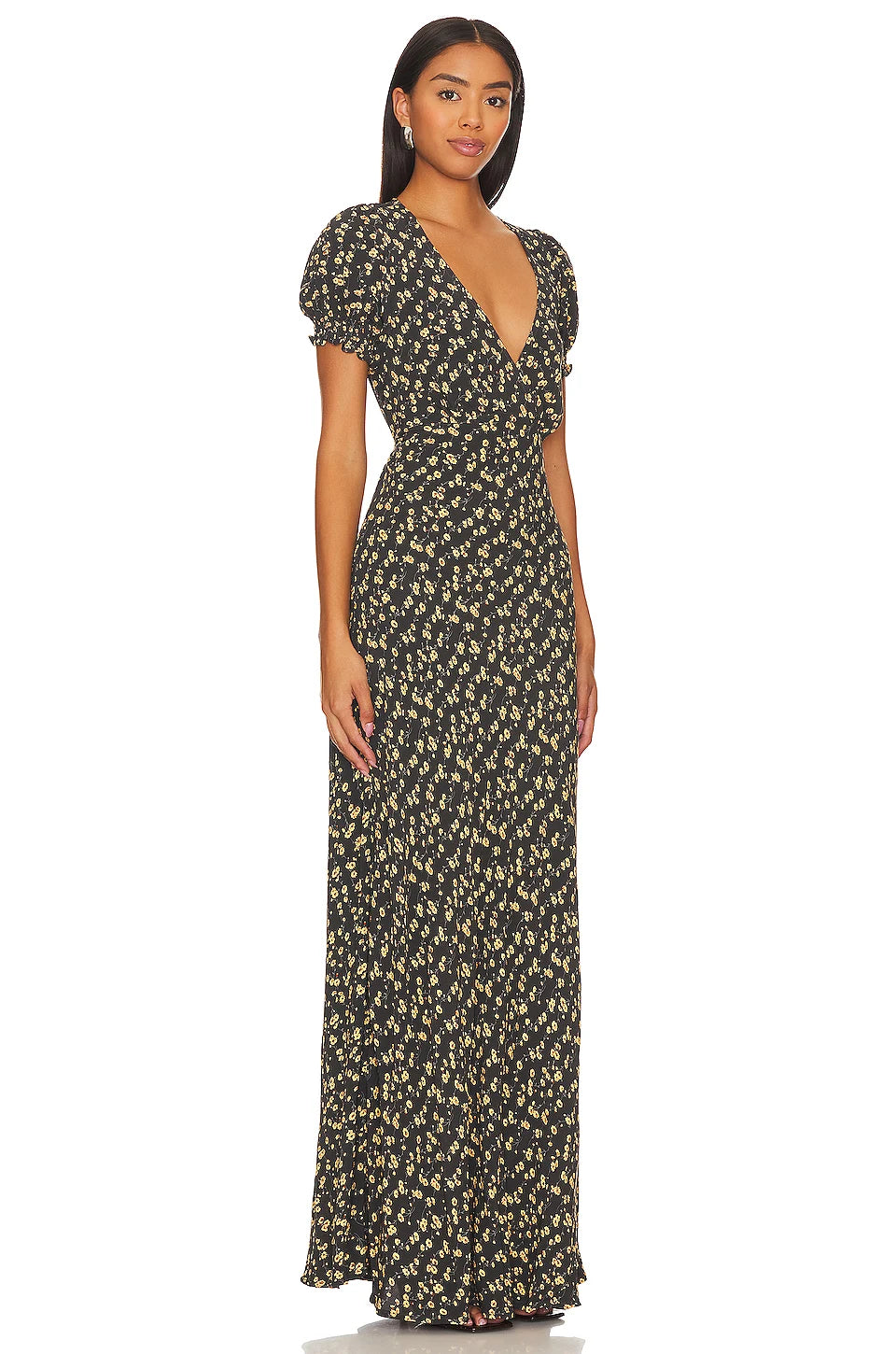 The Reis Maxi Dress is a stunning addition to any wardrobe, offering a sophisticated and elegant look with its silk fabric and intricate Chrysanthemum pattern. Perfect for any occasion, this long dress exudes femininity and style for the modern woman.