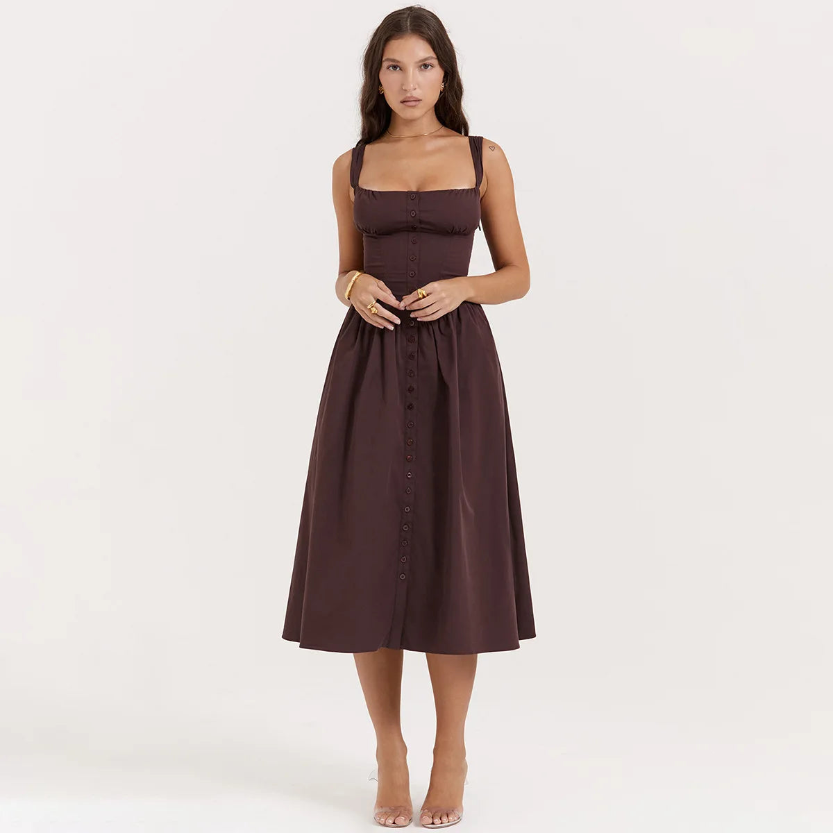 Experience the height of fashion with Dress Tatiana! This stunning midi dress features a spaghetti strap design and a beautiful brown color that will surely turn heads. Its flowing silhouette adds elegance to any outfit, making it perfect for any occasion. Be a trendsetter with Dress Tatiana!