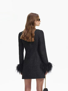 Elevate your style with the SELF-PORTRAIT Feather-trimmed bouclé minidress. This dress features a unique bouclé fabric and delicate feather trimming, creating a statement piece that exudes elegance and sophistication. Perfect for any special occasion, this dress is sure to turn heads and make you feel confident and stylish.