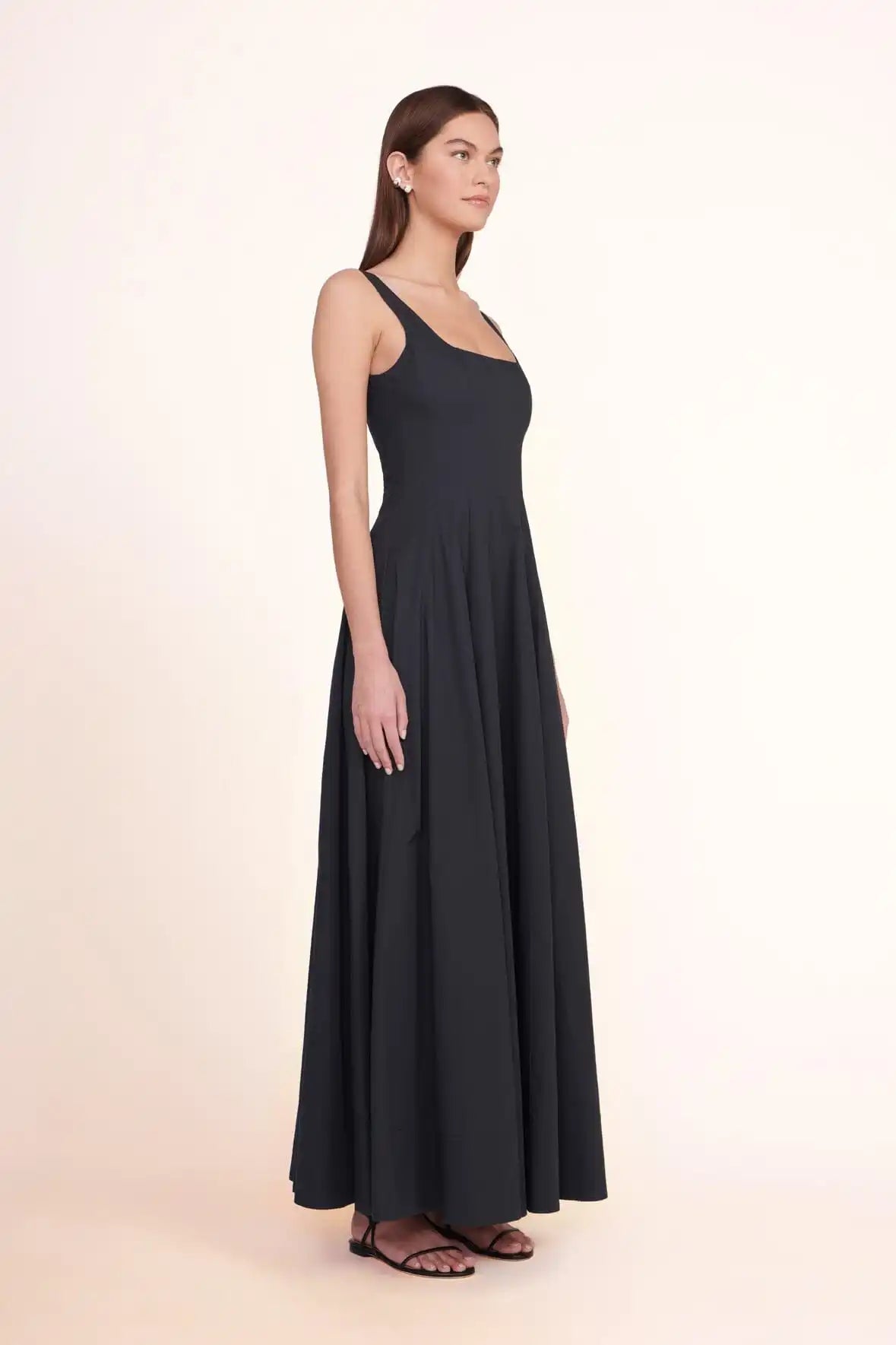 Stylishly elegant, the STAUD Wells Maxi Dress is a high-quality, designer piece that will make you feel confident and beautiful at any event. Handmade and customizable, this dress is perfect for a banquet or any upscale occasion. Make a statement with this stunning, one-of-a-kind dress.