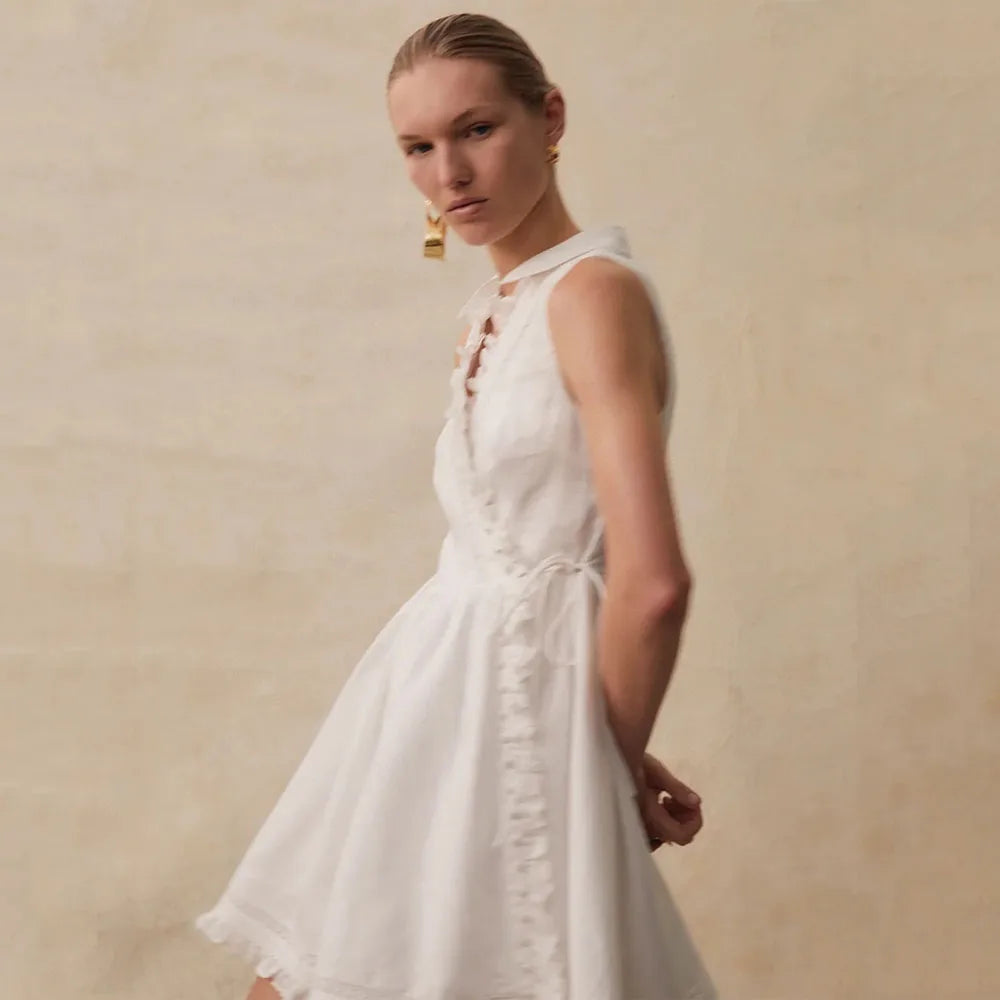 Experience effortless elegance with Dress Amelia! Crafted from luxurious Australian linen, this sleeveless dress features delicate lace detailing and a flattering wrap silhouette that accentuates your waist. Perfect for the minimalist girl seeking a touch of sophistication.