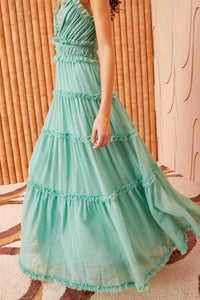 Experience the exquisite beauty of the Ulla Johnson New Mint Green Dress. Perfect for banquets and special occasions, this dress flows elegantly for a long and flattering silhouette. The soft mint color adds a touch of freshness and glamour. Make a statement and inspire others with this dress!