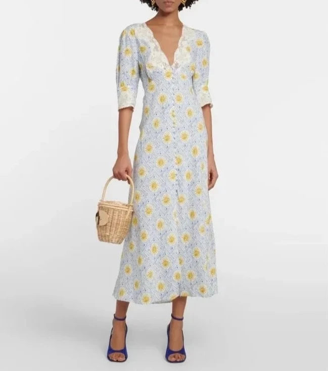 Introducing our newest addition for the summer season - Dress Simone. This elegant and stylish V-neck dress features delicate lace trim and a flattering high waist design. Perfect for any occasion, its lightweight fabric will keep you comfortable and cool while its unique print adds a touch of sophistication to your wardrobe.