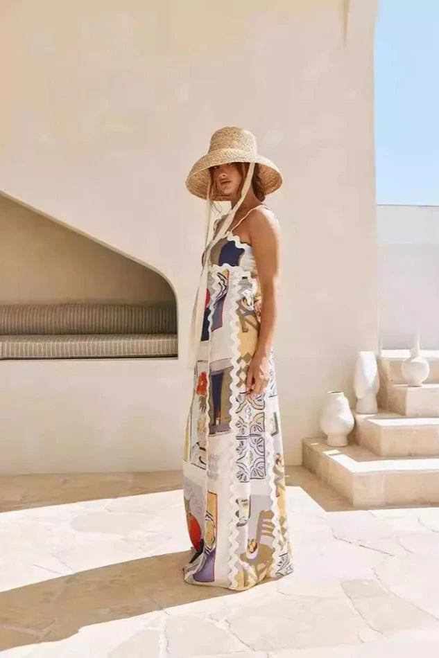 Indulge in luxurious style with our Amarella Maxi Dress. This elegant, oversized dress features a 3D print that adds depth and dimension to your look. Perfect for any occasion, from the beach to a stylish event, this sleeveless dress will make a statement and keep you comfortable with its loose fit. Make a fashion-forward statement with this stunning dress.