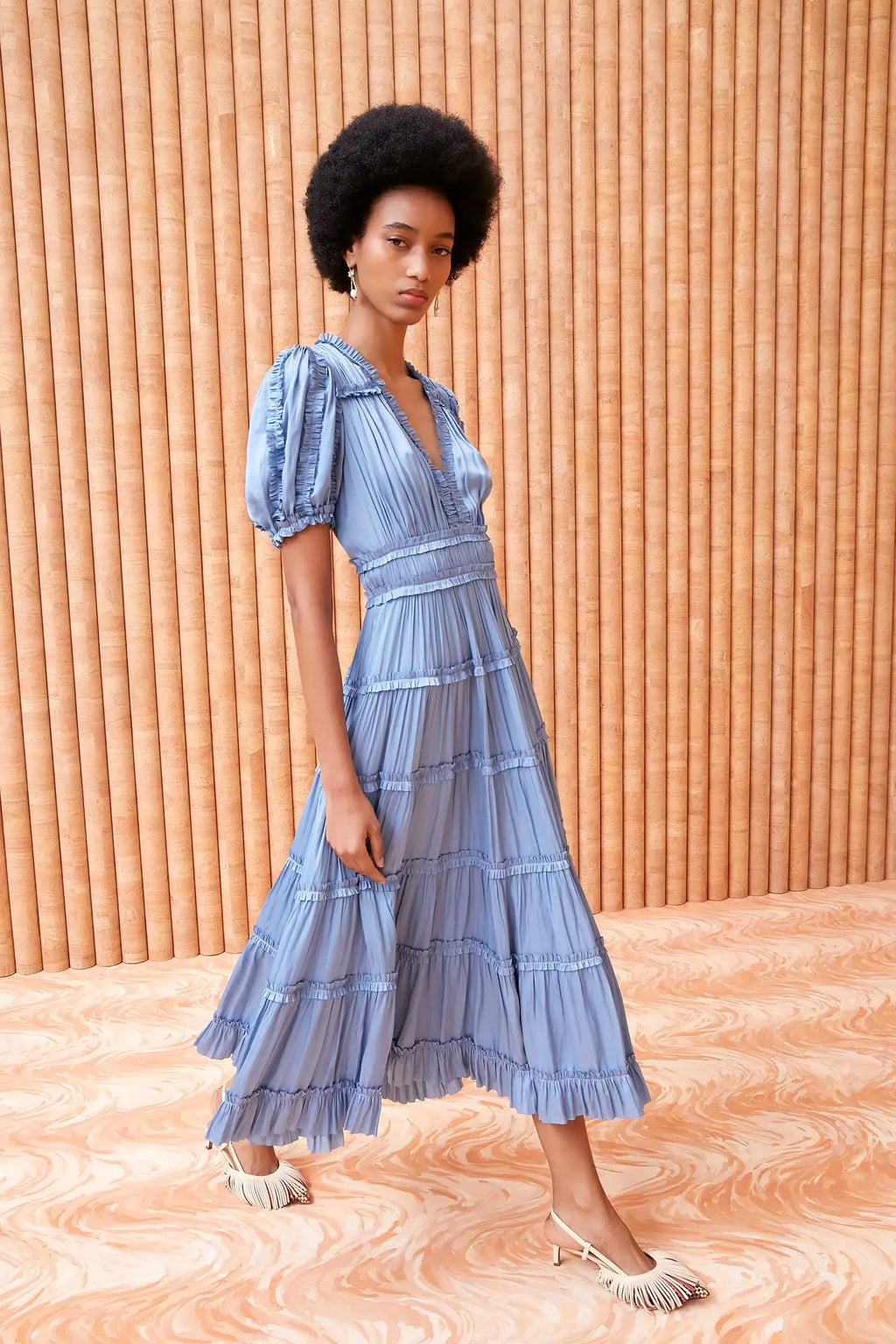 Discover the elegant style of the Rose Dress. Handmade with high-end designer details, this long blue dress exudes sophistication and luxury. Elevate your wardrobe and make a statement with this one-of-a-kind piece.