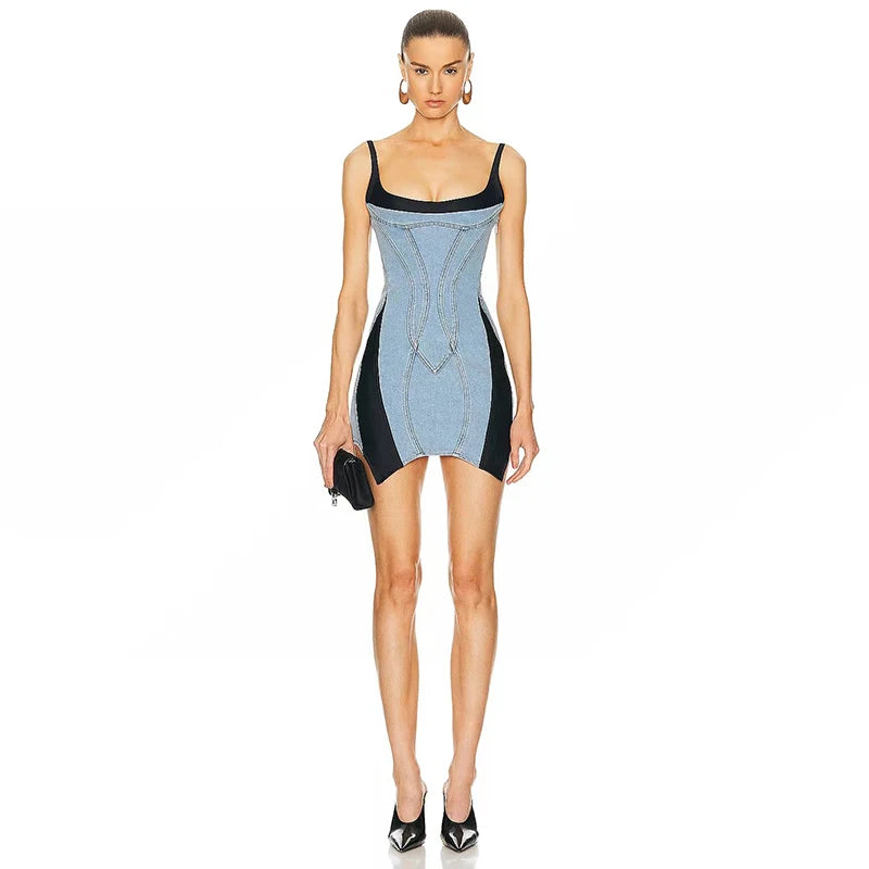 This MUGLER Blue &amp; Black Paneled Denim Minidress features a unique splicing design, adding a touch of sexy and alluring charm to your wardrobe. The backless halter style highlights your figure, while the slim fit enhances your silhouette. Perfect for a night out or special occasion.